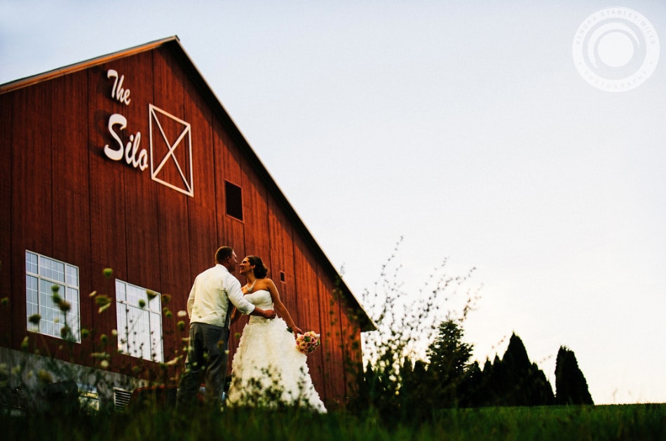 couple in front of silo venue